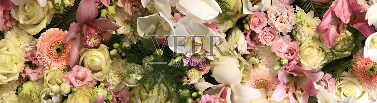 花墙背景。手工制作婚礼装饰。混合彩色花卉背景。巴洛克和复古风格。花的图案。情人节的背景。婚礼花。照片摄影图片