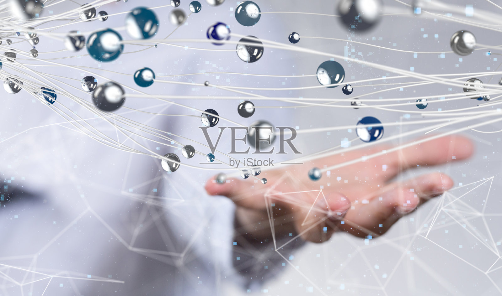 一个男人手掌上相互连接的点的全息图照片摄影图片