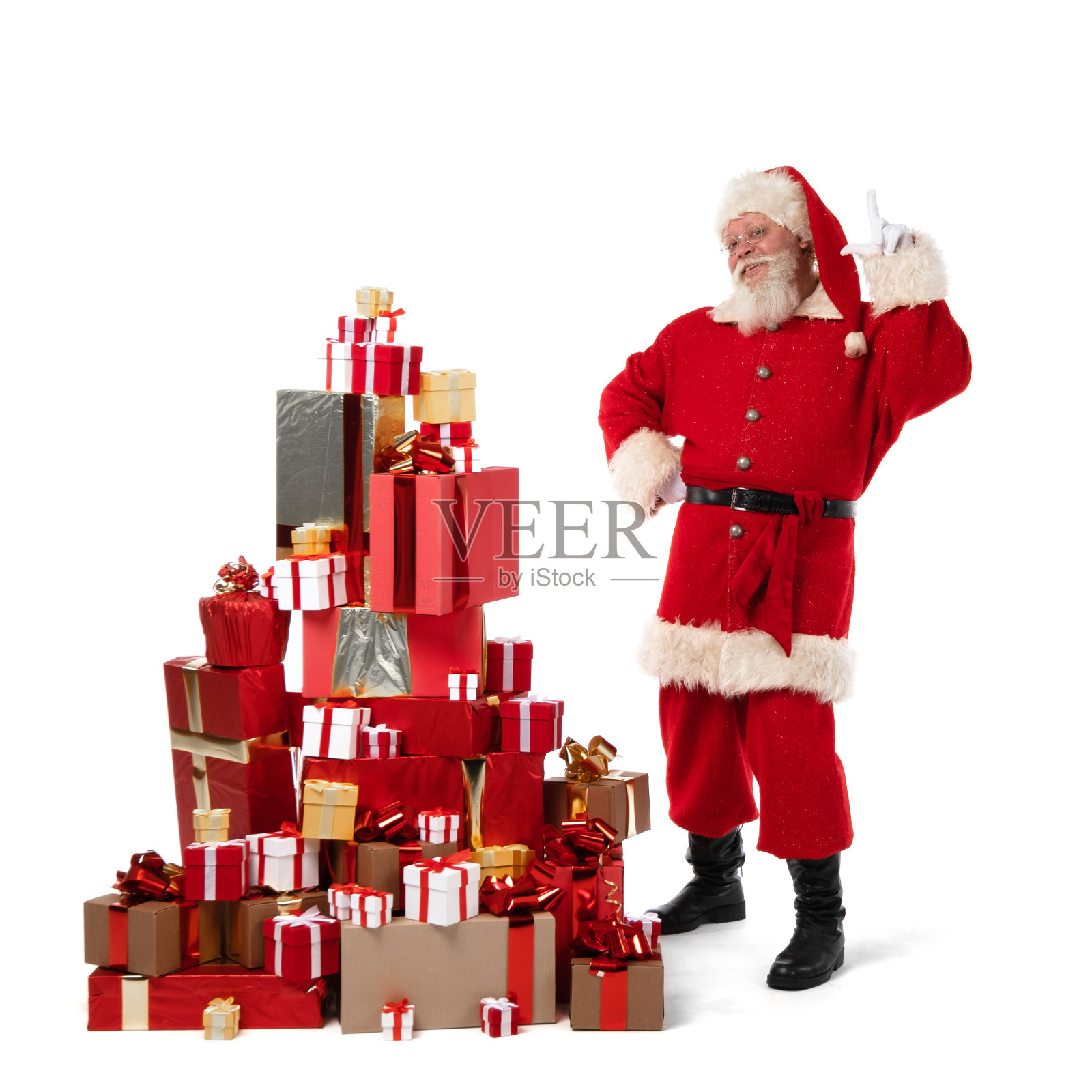 圣诞老人带着一堆圣诞礼物照片摄影图片