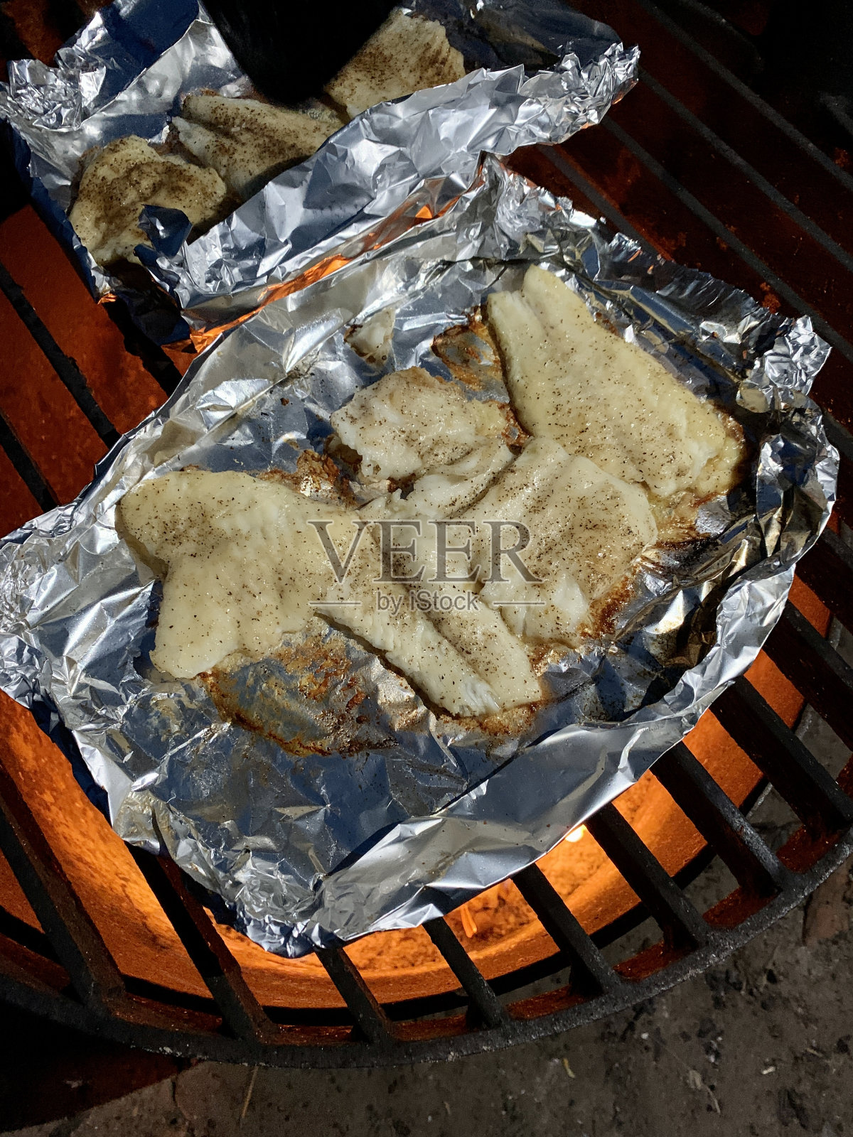 捕捞和烹饪照片摄影图片