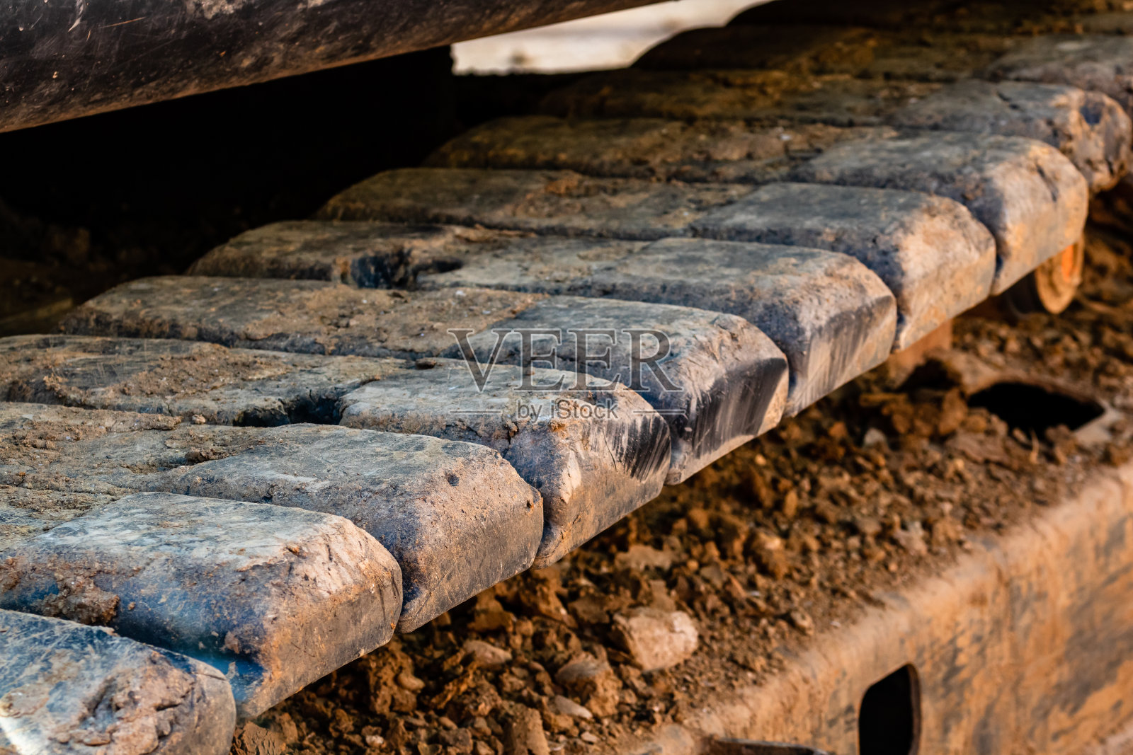 工业挖掘机在建筑工地工作的细节照片摄影图片