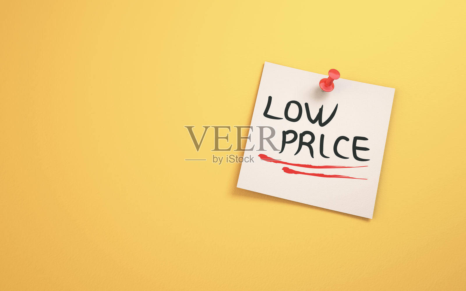 低价文字写在便签纸坐在黄色背景照片摄影图片