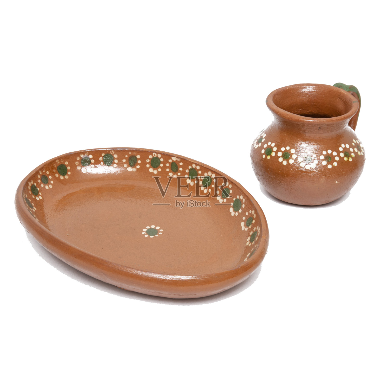 来自墨西哥的传统手工陶制餐具。照片摄影图片