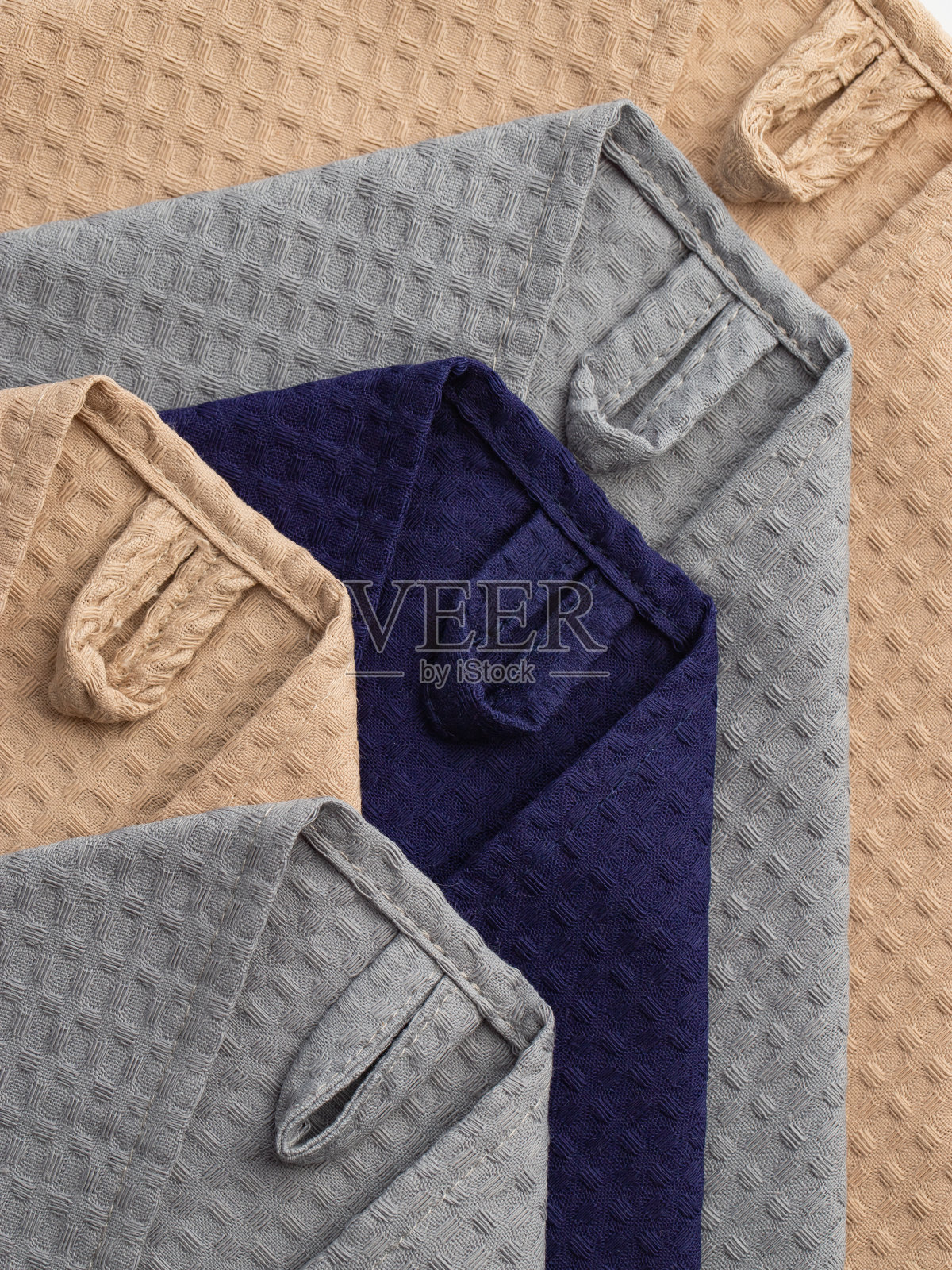 不同颜色的棉织物，无图案的华夫毛巾，宏观照片摄影图片