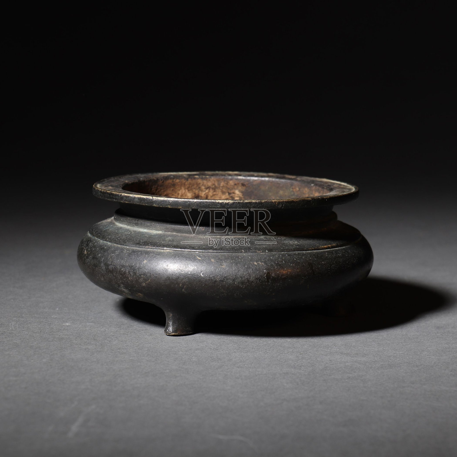 一个中国古代木壶的特写镜头照片摄影图片