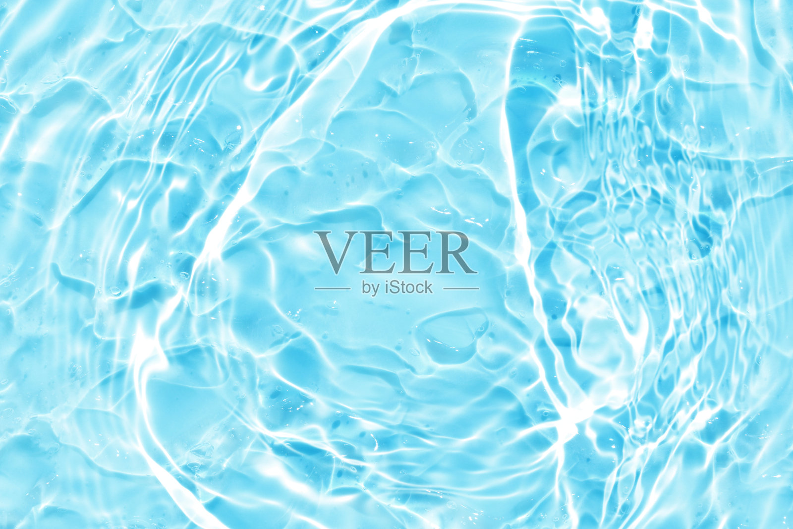 蓝色水波抽象，自然波纹和泡沫纹理，凝胶皂，背景摄影照片摄影图片