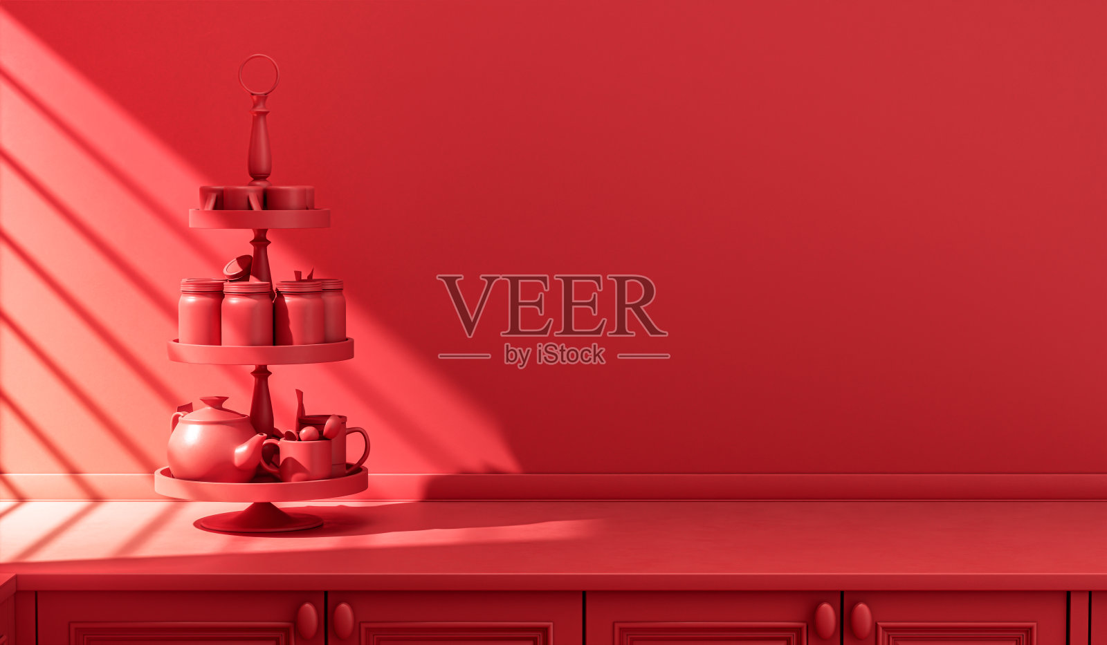 程式化的单色红色厨房柜台和日常用具在早晨的阳光。照片摄影图片