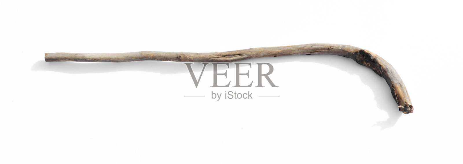 白色背景下的古代牧羊手杖照片摄影图片