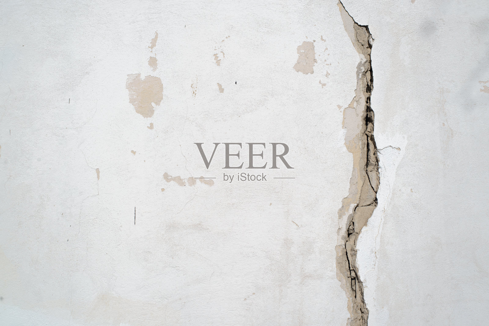 墙面破损有裂纹，拷贝空间大。粗糙的混凝土墙纹理不均匀的背景照片摄影图片