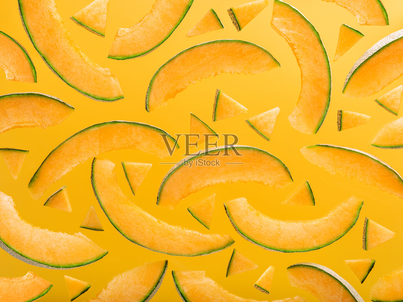 熟透的哈密瓜片作为图案。照片摄影图片