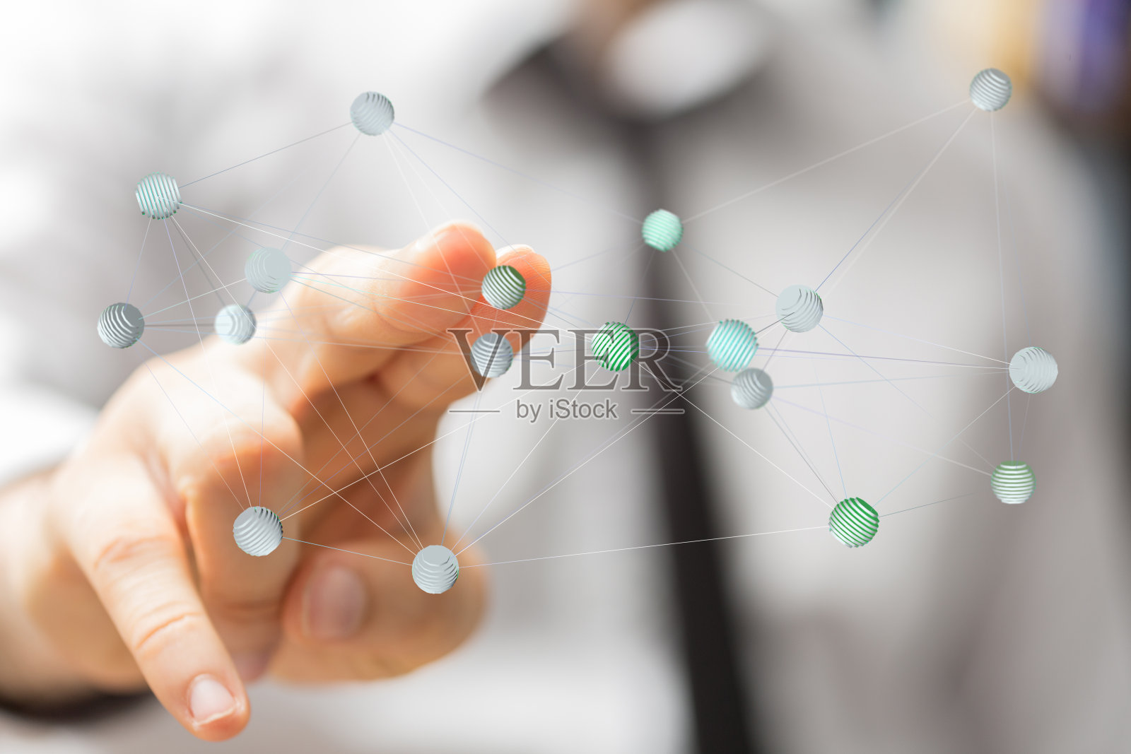 浅聚焦一个人手指向组织结构图图标，团队网络概念照片摄影图片
