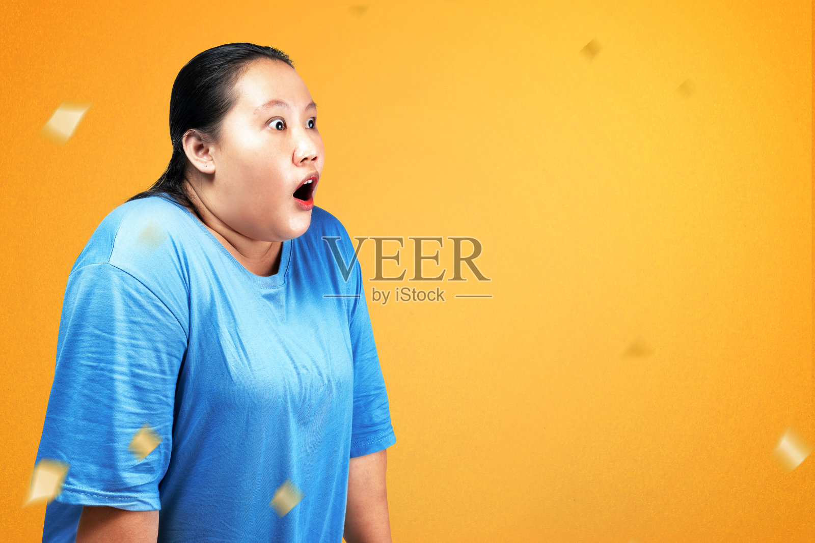 亚洲肥胖超重的女人与震惊的表情照片摄影图片