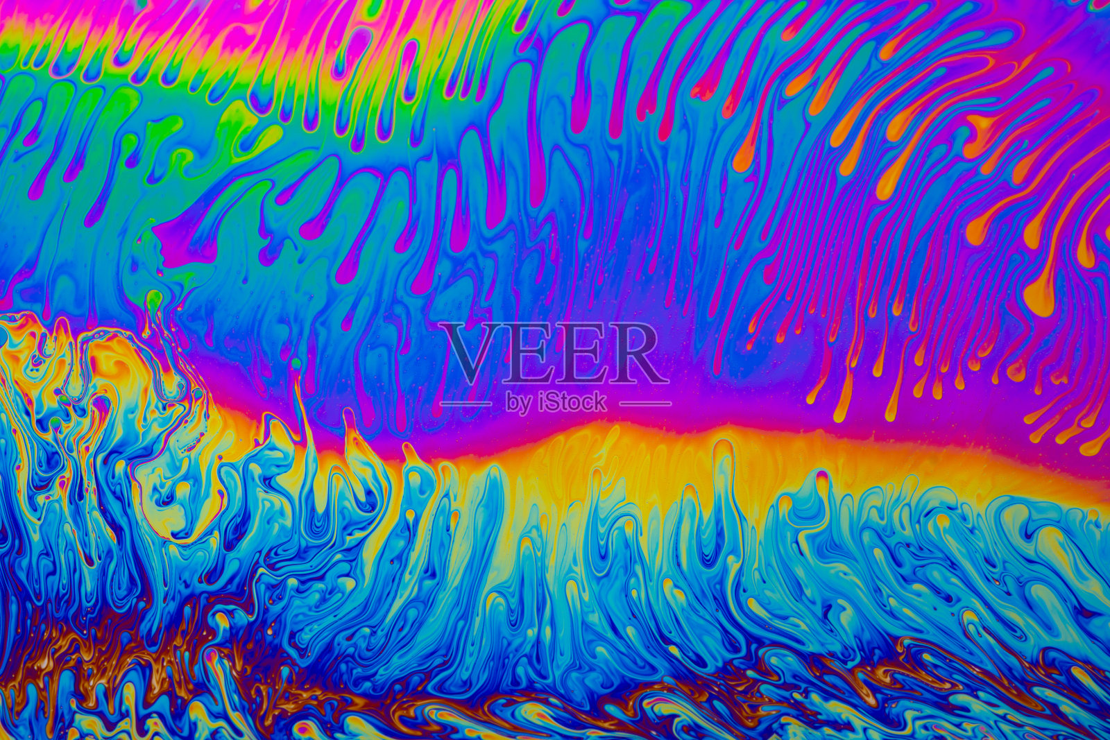 迷幻的多色背景抽象。彩虹的颜色。模式的背景。肥皂泡的微距照片照片摄影图片