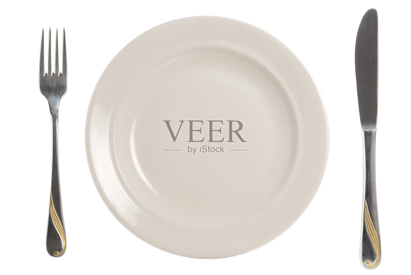 用刀叉装盘子照片摄影图片