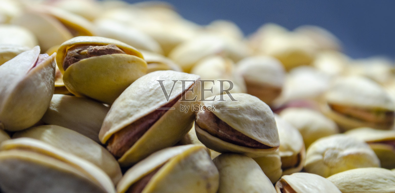 靠近开心果照片摄影图片