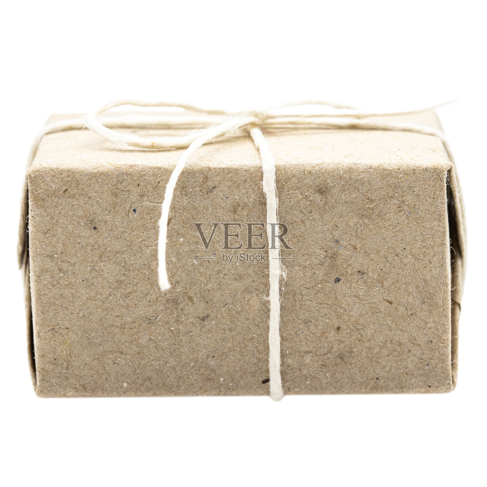 一个天然棕色的礼品盒或包裹，带绳带照片摄影图片