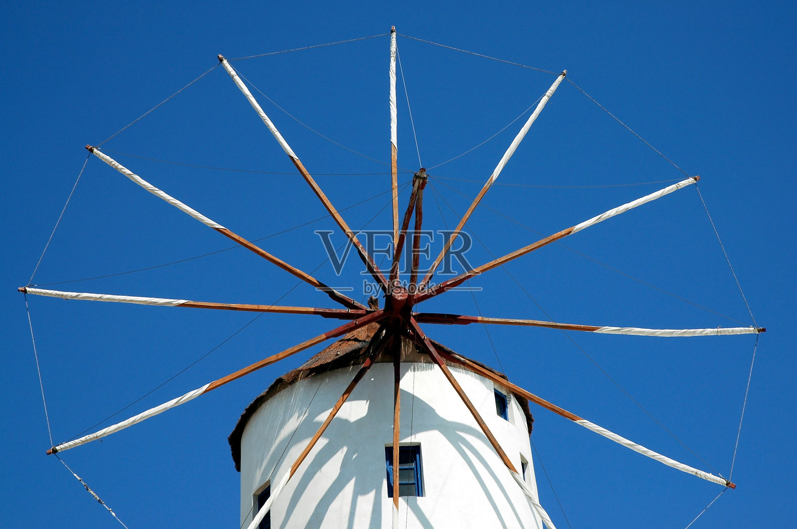 希腊圣托里尼岛伊亚岛的风车照片摄影图片
