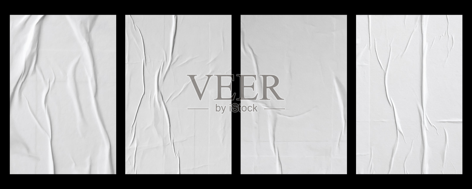 白色皱褶和折痕胶纸海报集孤立的黑色背景照片摄影图片