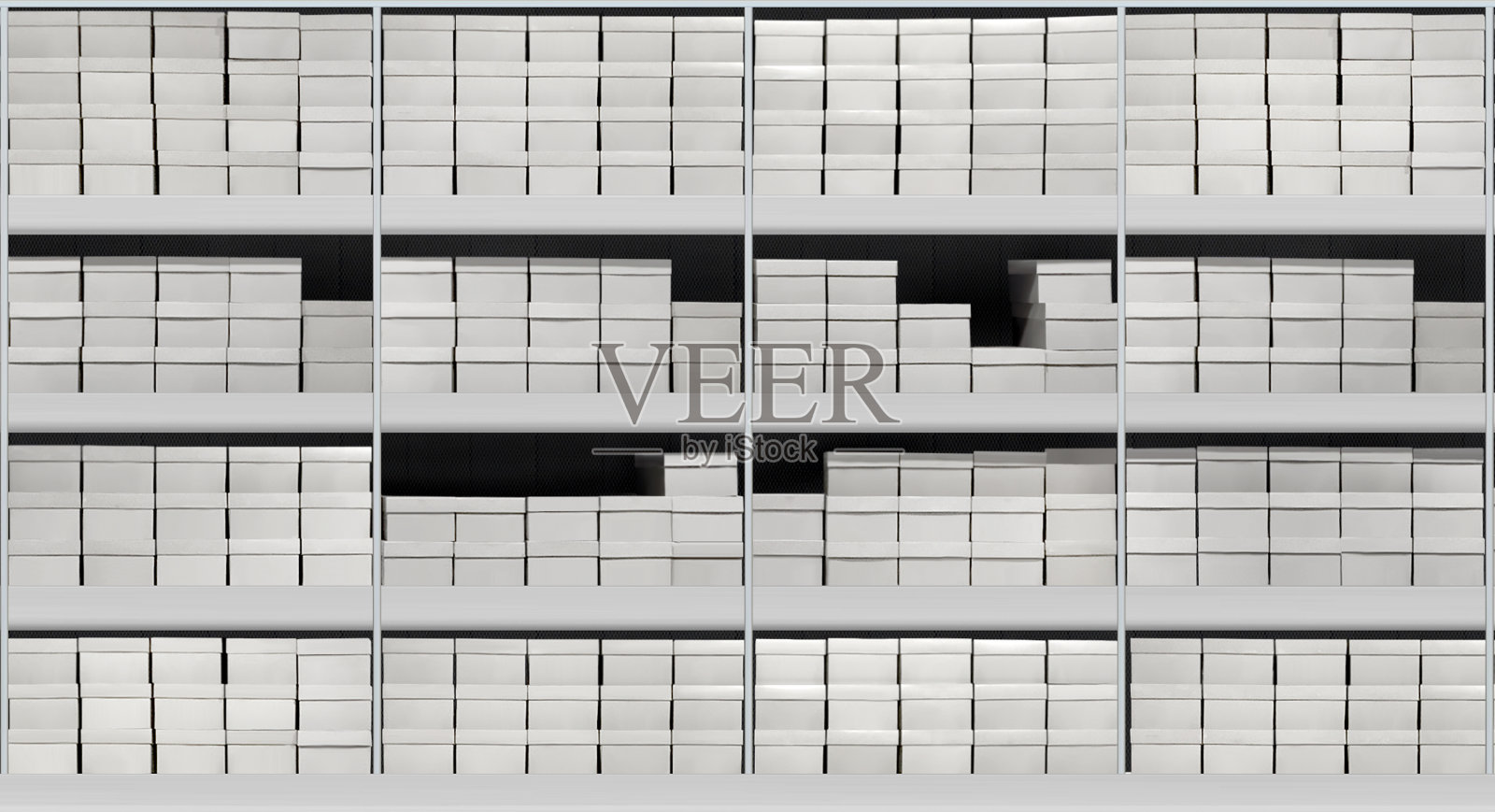 鞋店货架上的鞋盒照片摄影图片