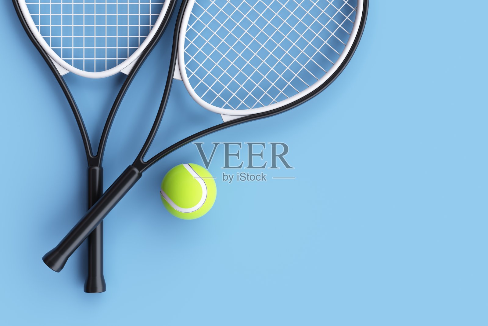 网球拍与网球在蓝色背景照片摄影图片