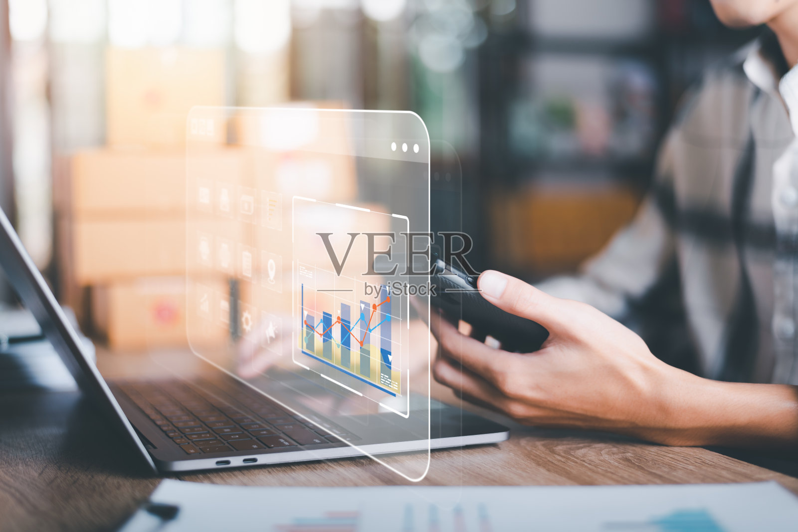 初学者或小型企业企业家，分析网上销售业务报告，图表和市场统计，购物车和促销项目，电子商务概念和网上销售网站照片摄影图片