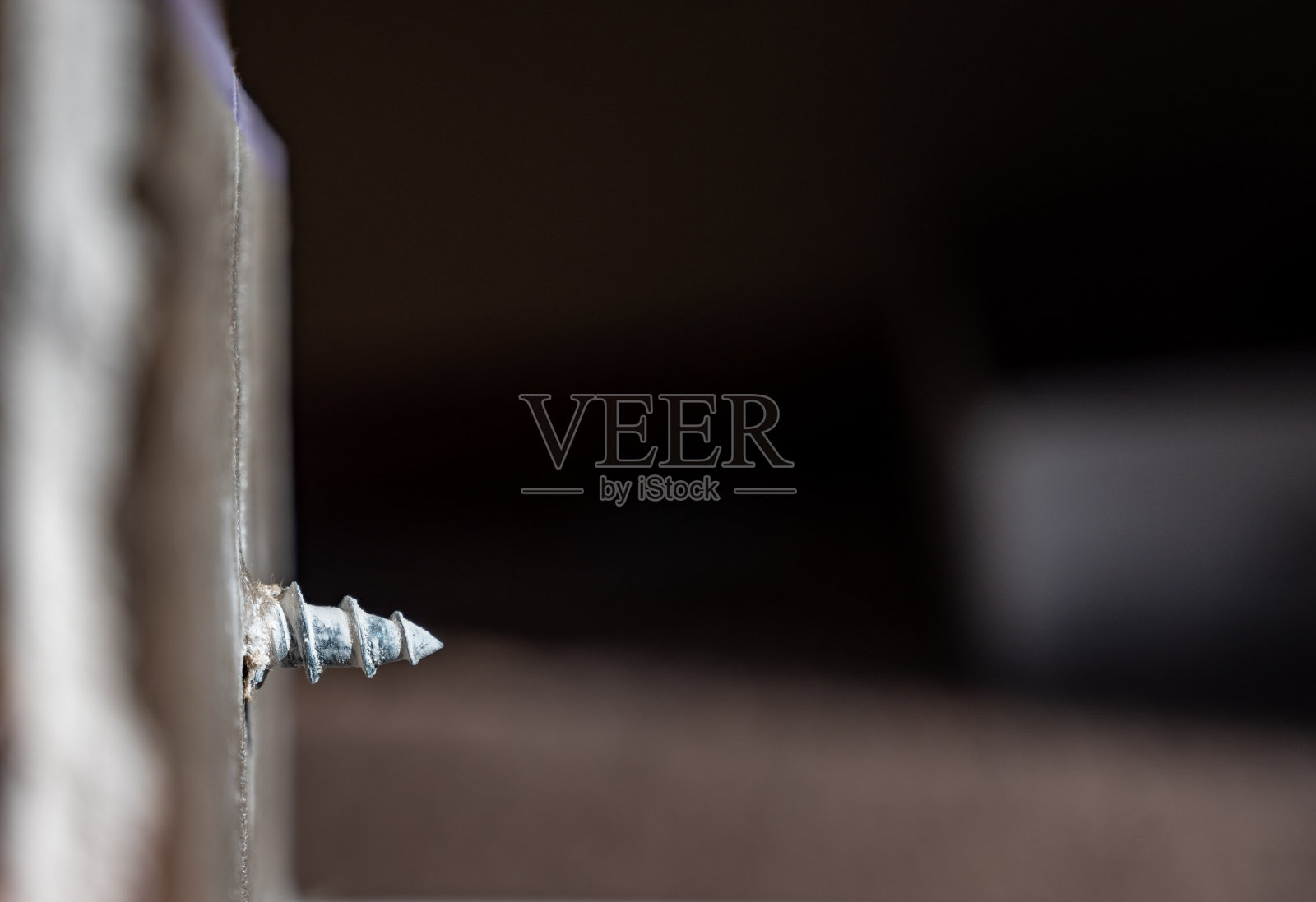 石膏板安装锚和螺钉的侧面视图照片摄影图片