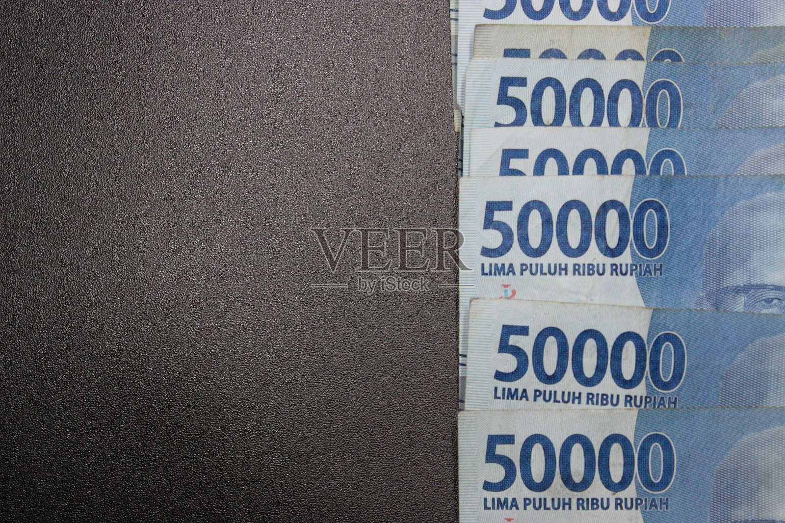 印尼钞票。五万卢比。照片摄影图片