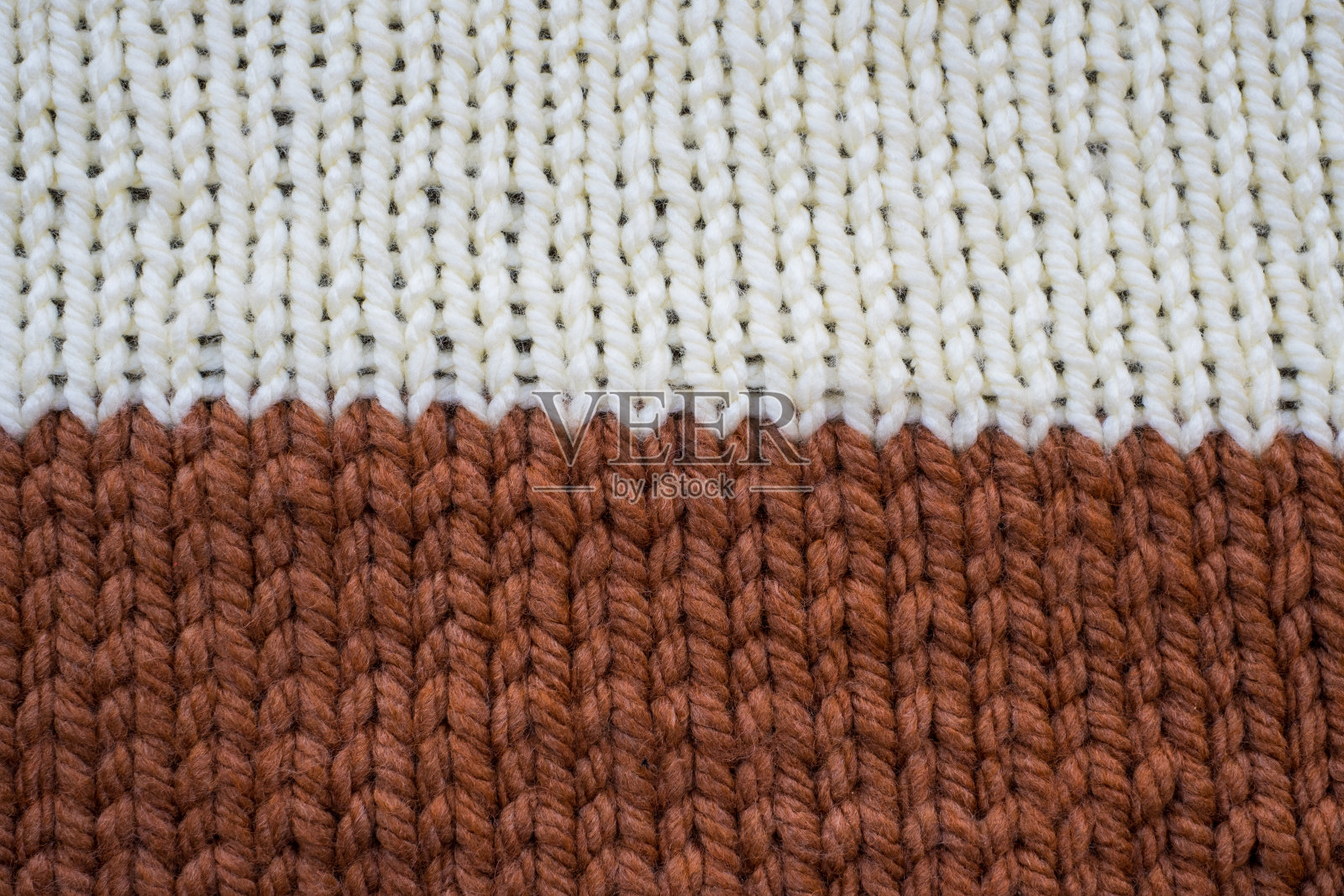 羊毛制的花纹织物手工针织面料，白色和棕色的羊毛背景纹理照片摄影图片