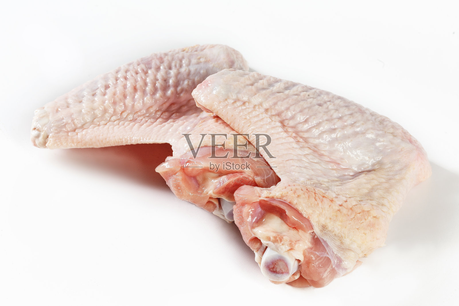 新鲜火鸡或家禽肉，白色背景照片摄影图片