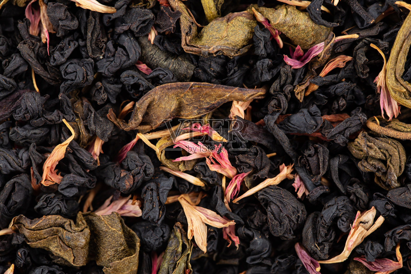 变形。草莓口味的红茶和百香果照片摄影图片