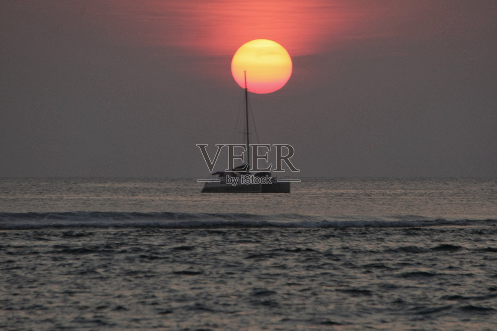 帆船和美丽的日落照片摄影图片