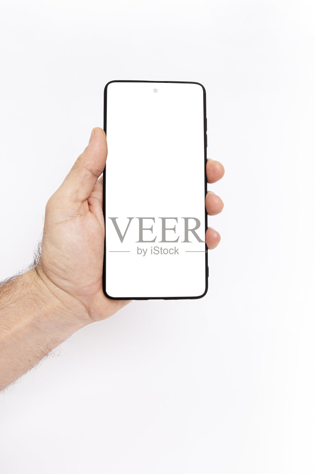 白色背景的手机。手持手机，白色背景。照片摄影图片