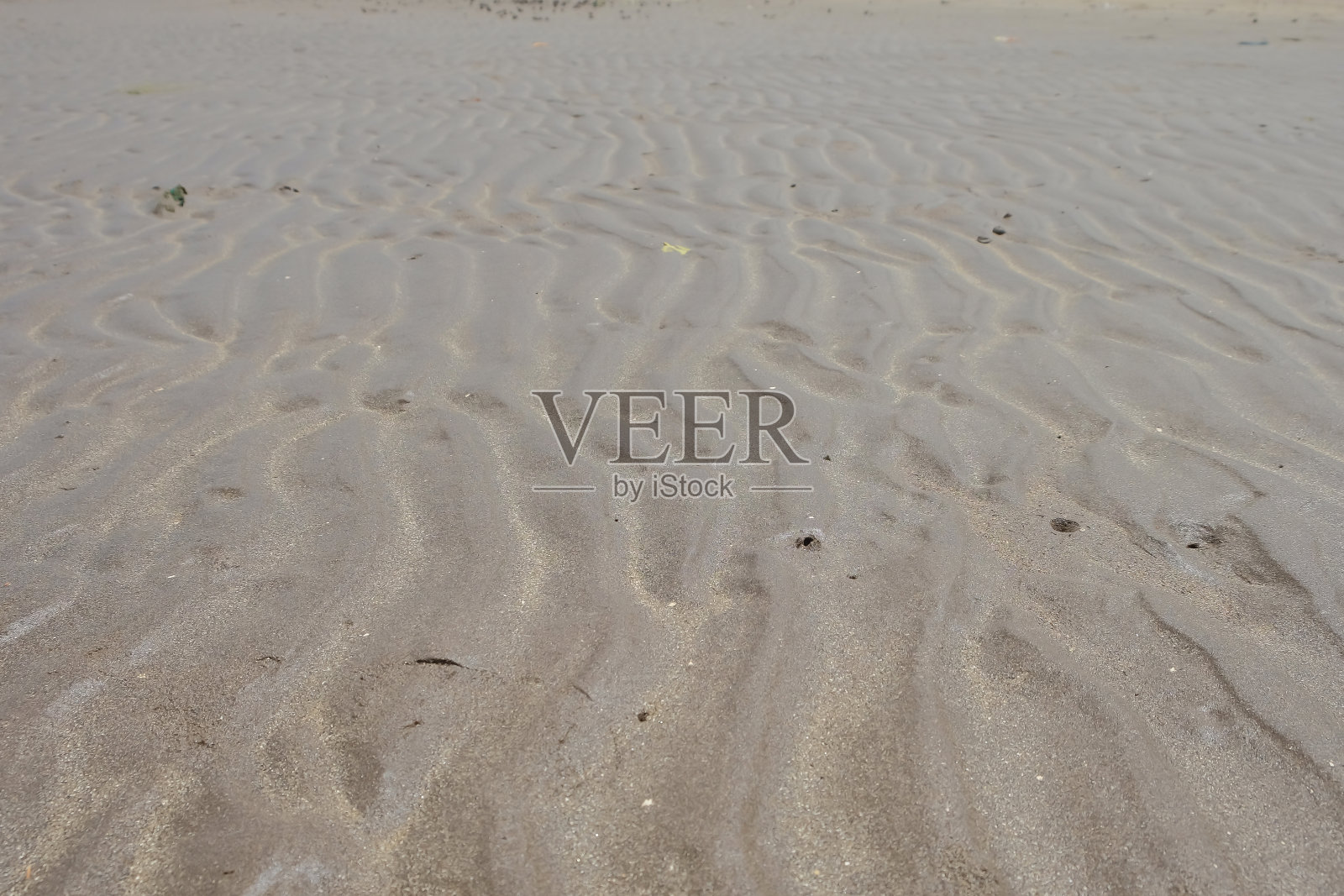 白天波浪形沙滩沙质，夏日旅游背景照片摄影图片