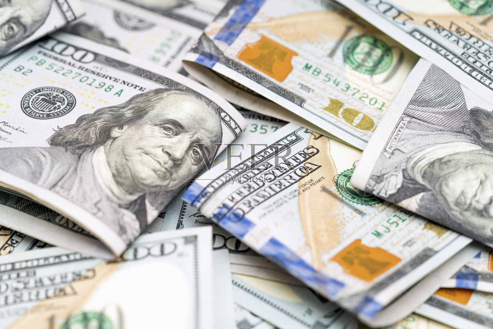 一堆美元钞票。钱的背景。美国的现金。货币。金融、支付、贸易、金融交易概念照片摄影图片
