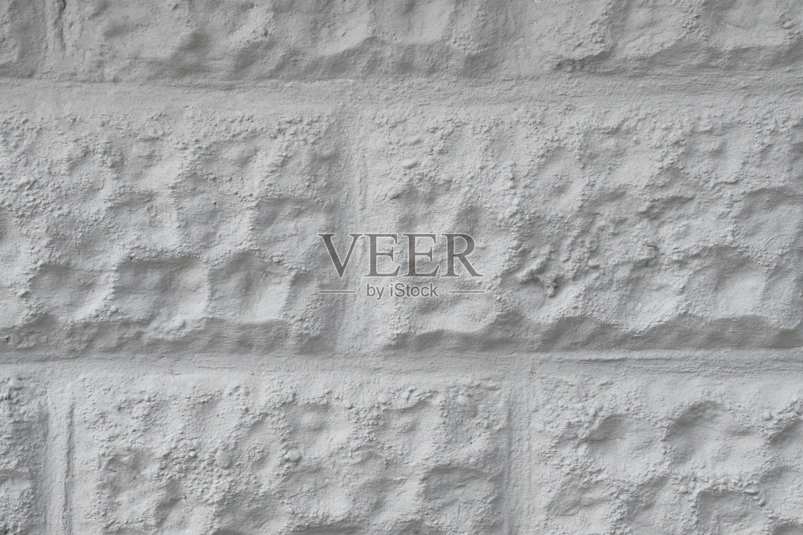 纹理的石膏砖墙模仿作为背景照片摄影图片