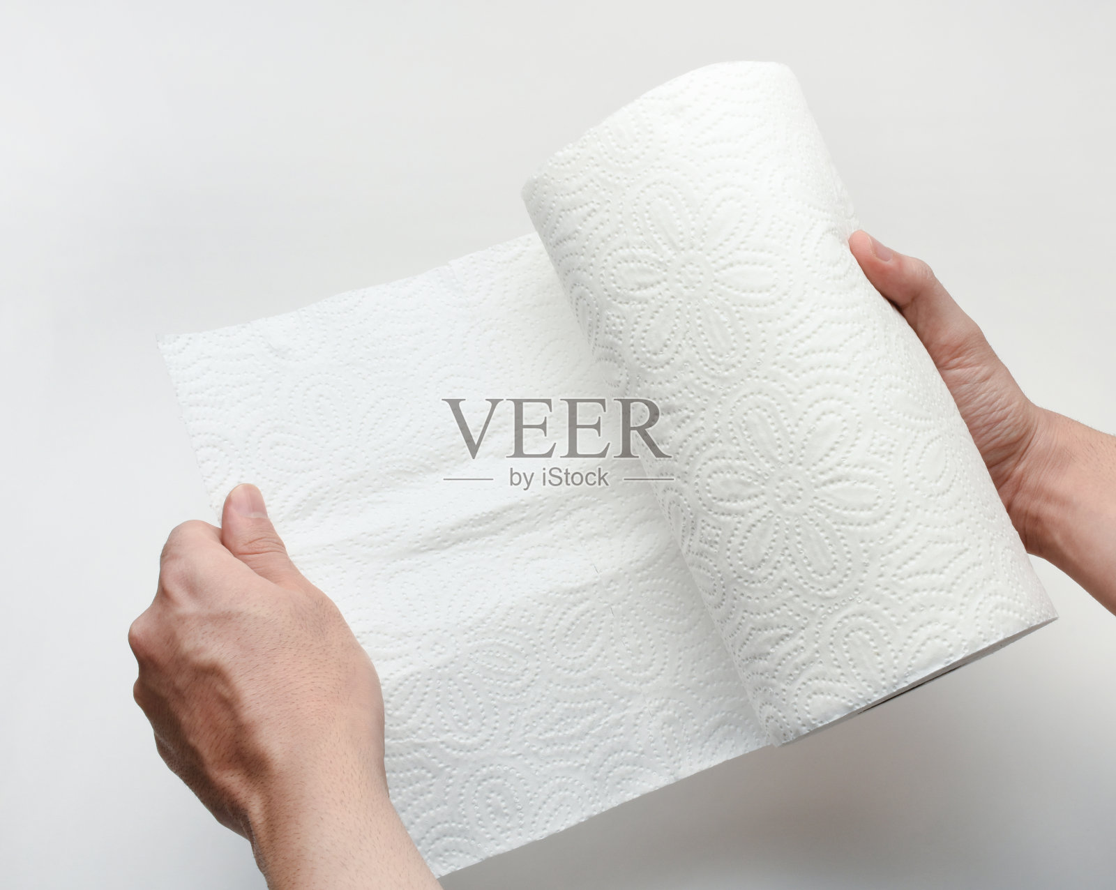 使用纸巾，手拿纸巾照片摄影图片