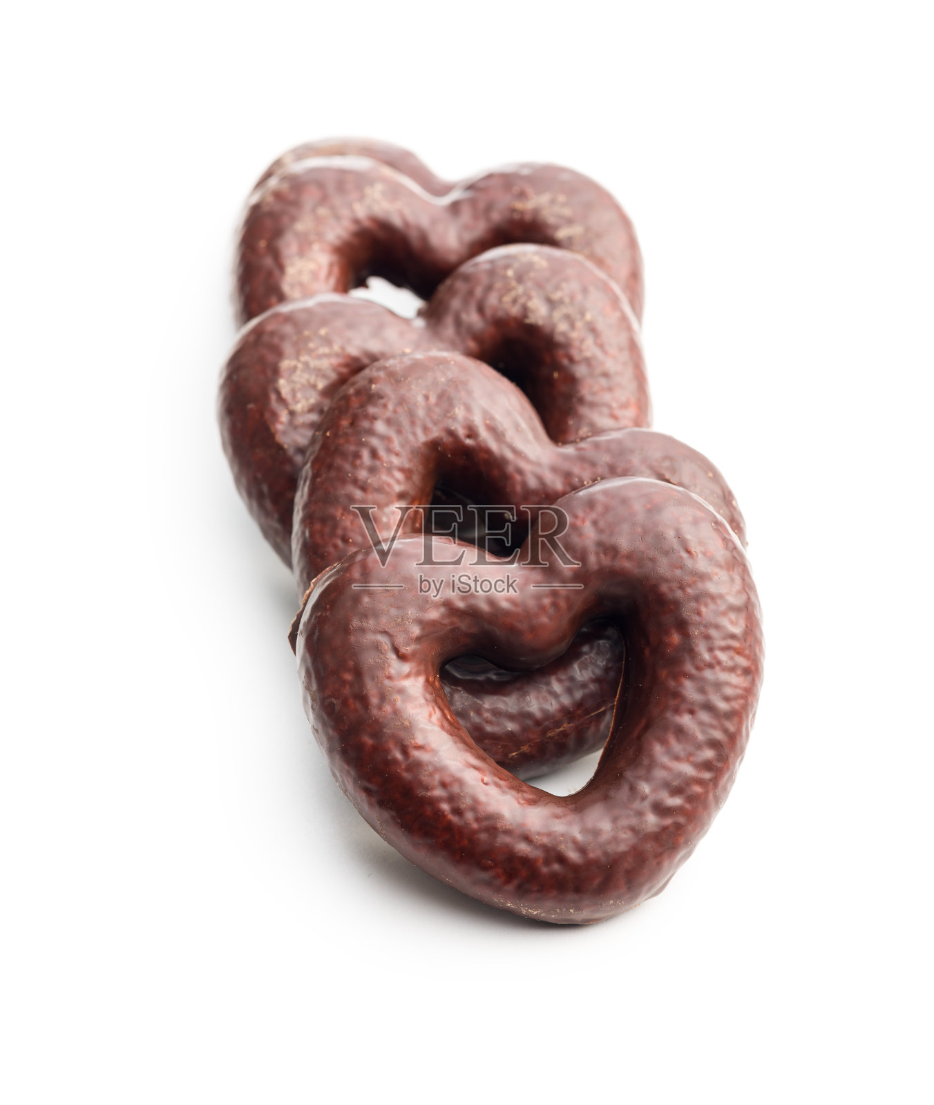 白色背景上孤立的甜蜜巧克力心。照片摄影图片