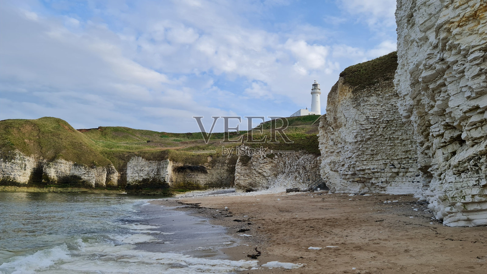 塞尔威克斯湾的灯塔和弗兰伯勒海岸照片摄影图片