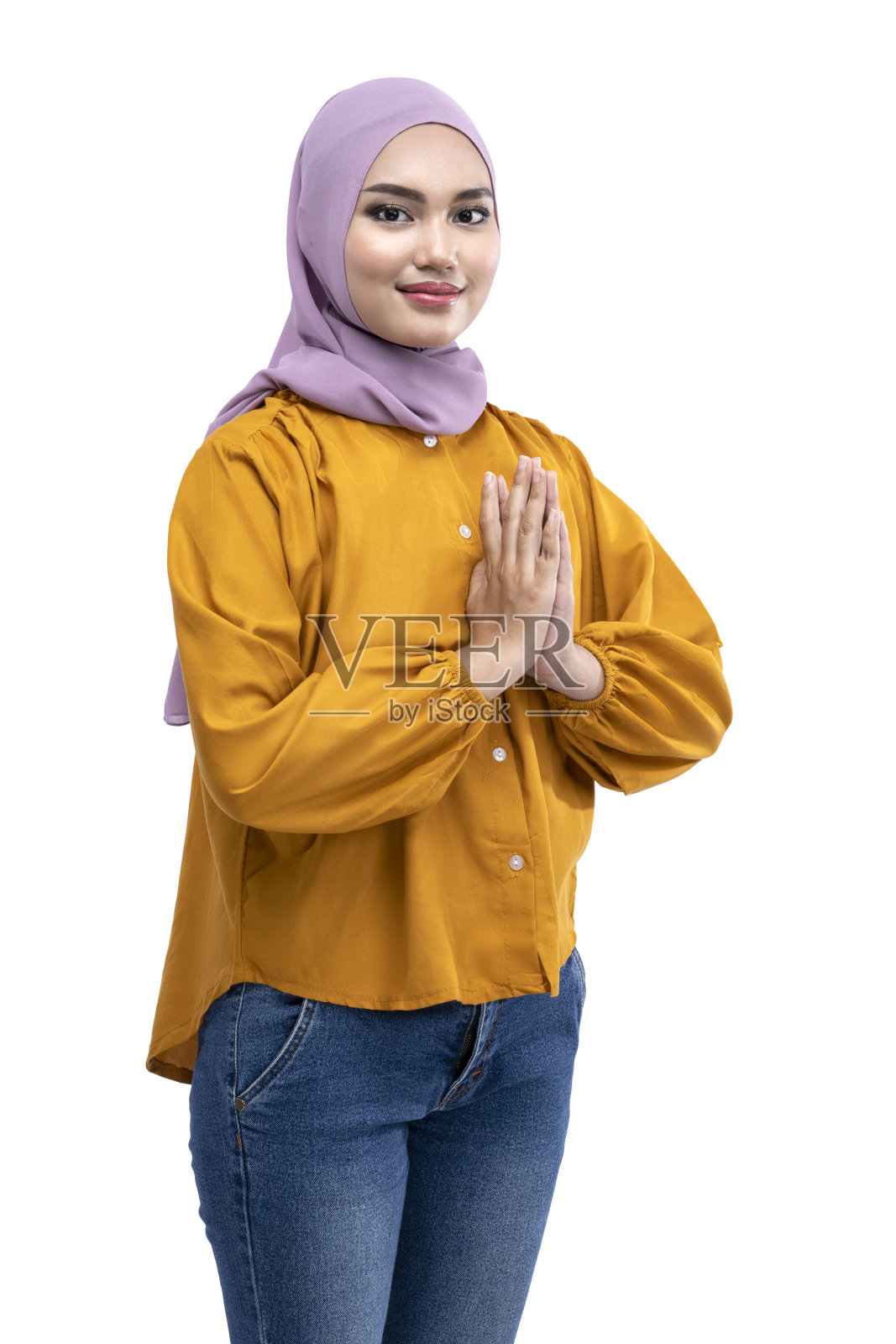 戴着头巾的亚洲穆斯林妇女做出问候手势照片摄影图片