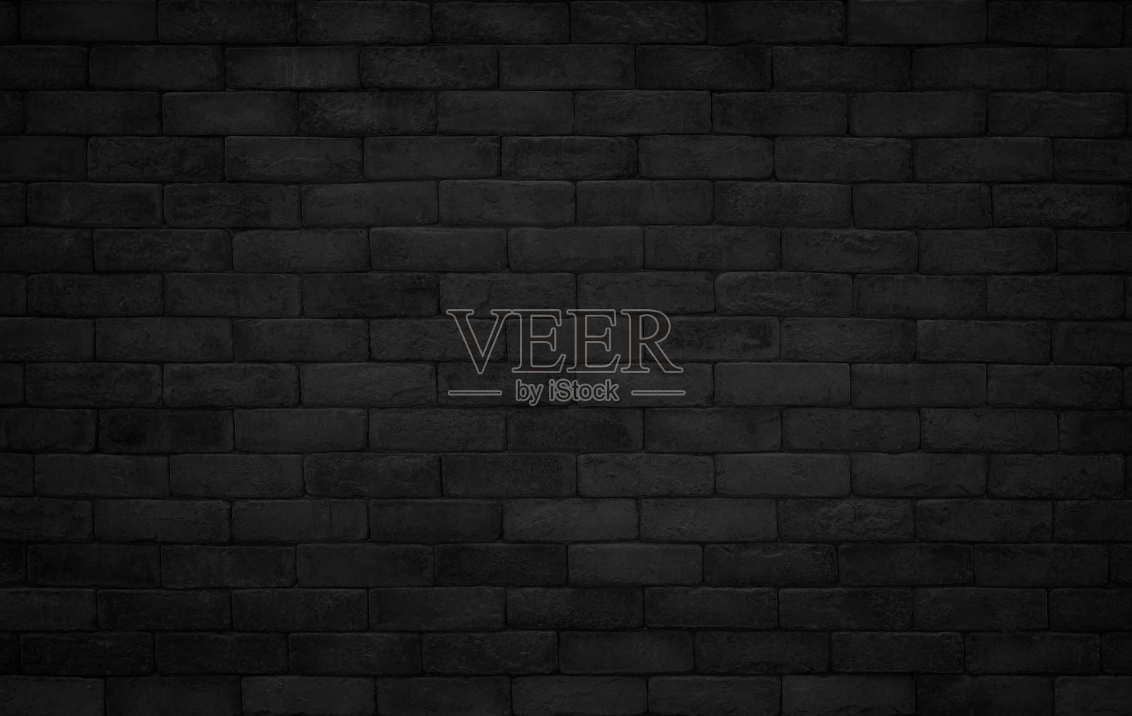 摘要深色砖墙纹理背景图案，墙砖表面纹理。砖墙粉刷成黑色的室内旧干净的混凝土网格凹凸不平，家居或办公室设计背景装饰。照片摄影图片