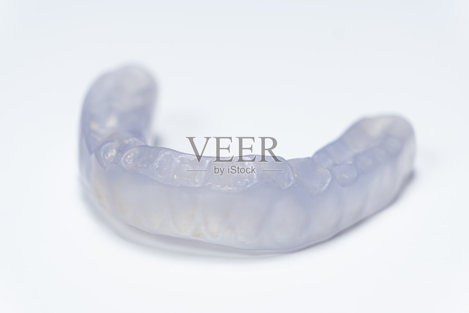 牙套，夹板用于治疗颞下颌关节功能障碍，磨牙症，错颌，放松下颌肌肉。照片摄影图片