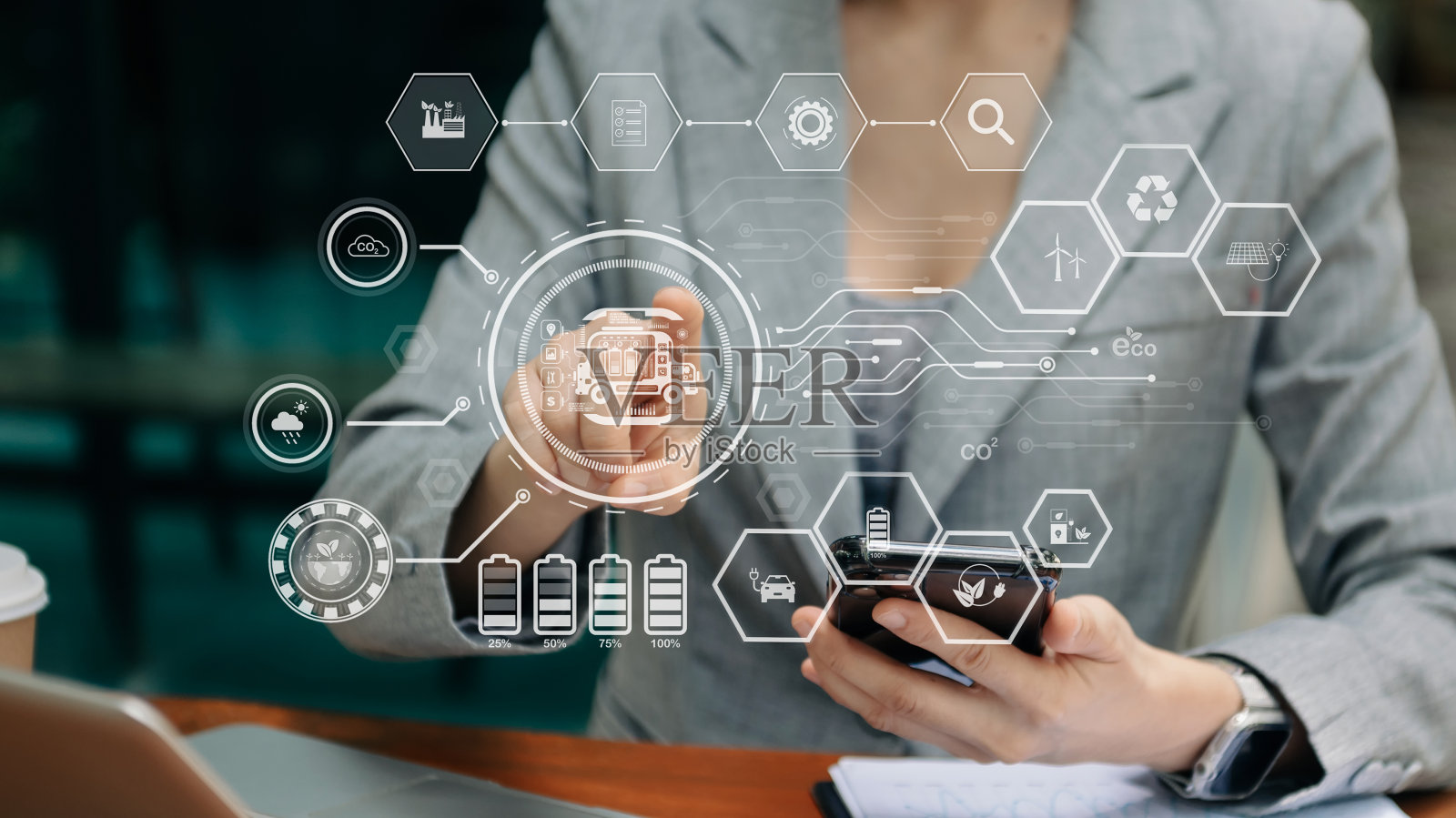 ESG环境概念，绿色道德商业保护资源，减少二氧化碳，商务人员团队在笔记本电脑虚拟智能手机上工作，以减少二氧化碳照片摄影图片