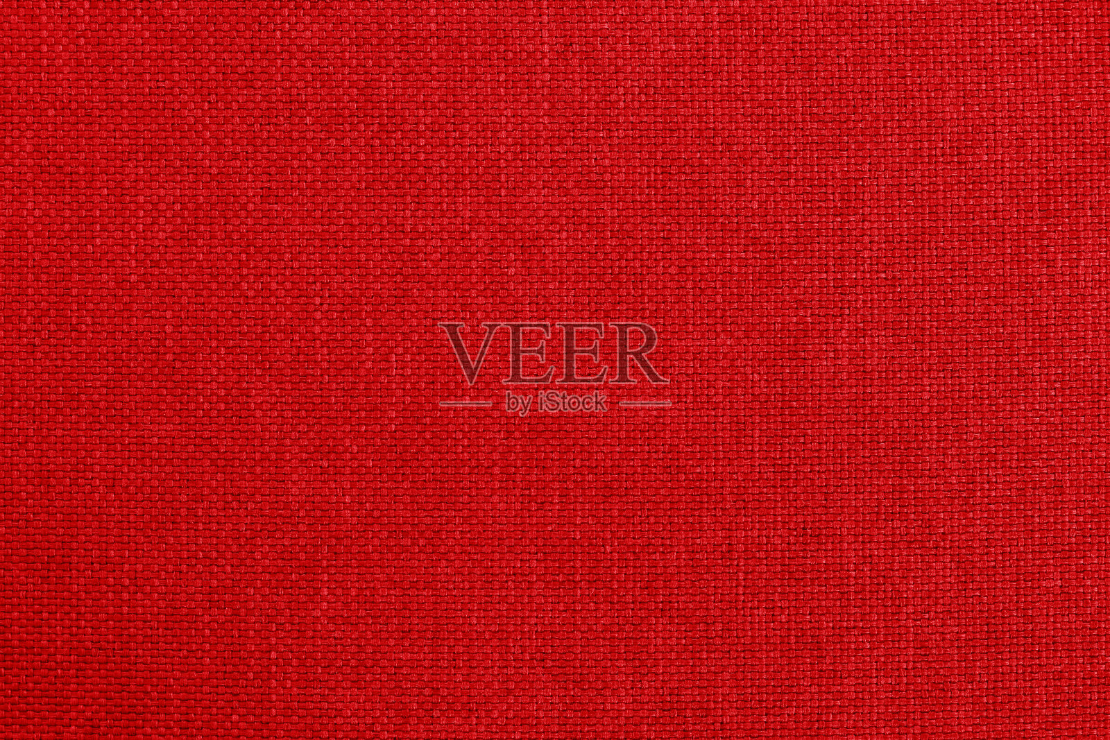 暗红色面料的布纹背景，天然纺织的无缝花纹。照片摄影图片