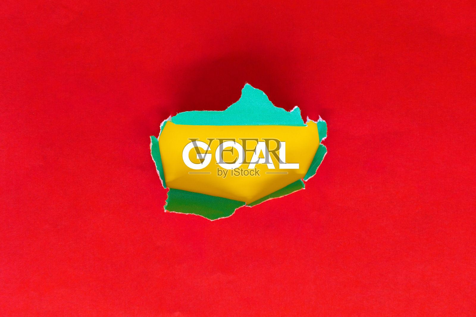 纸上有“目标”二字。照片摄影图片