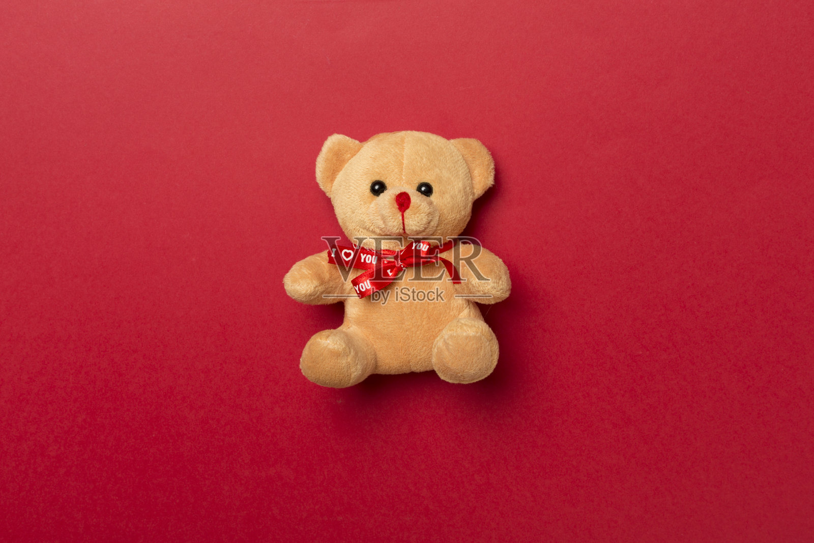 可爱的泰迪熊的颜色背景，俯视图照片摄影图片