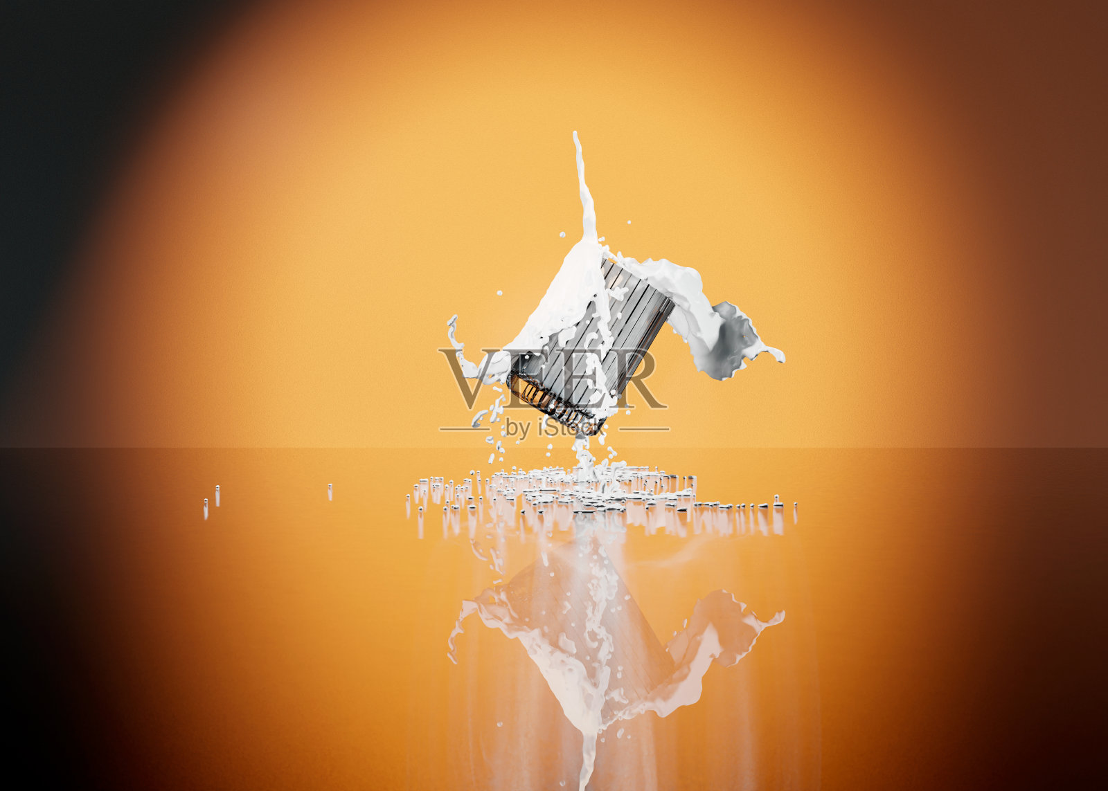 牛奶倒进带肋的玻璃杯里照片摄影图片