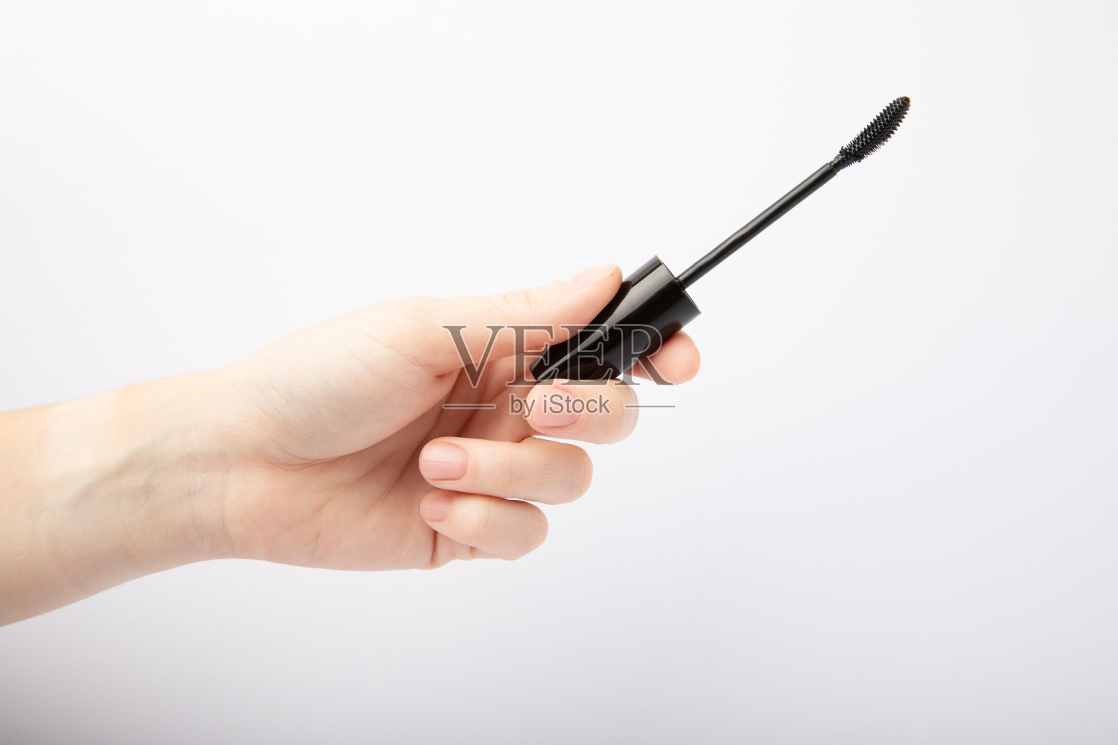 睫毛膏在白色背景上隔离照片摄影图片