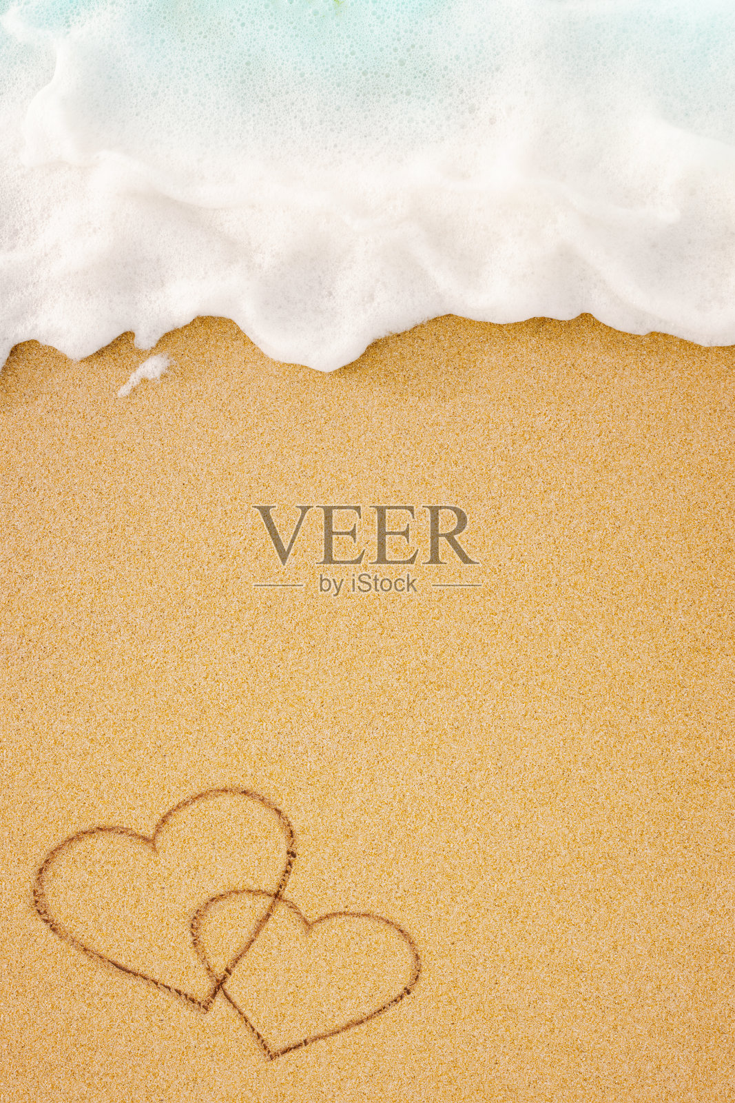 手写在沙子上的心形符号照片摄影图片