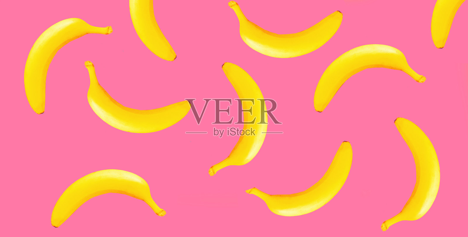 时尚的创意形象黄色香蕉在粉红色的背景照片摄影图片