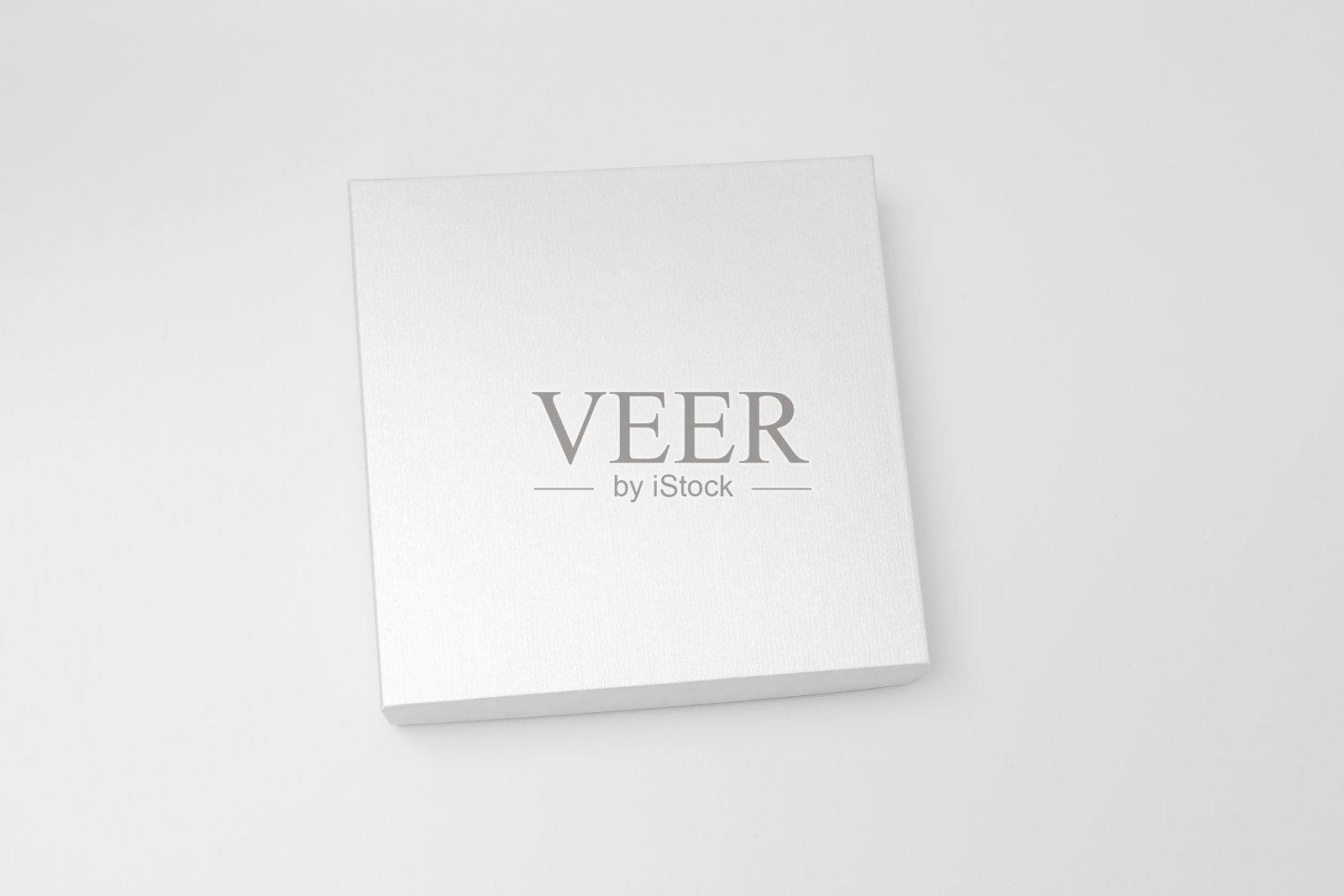 白色纹理的盒子，白色背景上的礼物模型。高分辨率照片。空白白色产品包装盒实物模型。容器，白色包装模板。纸箱。照片摄影图片